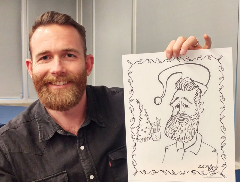 Man with Christmas themed caricature.